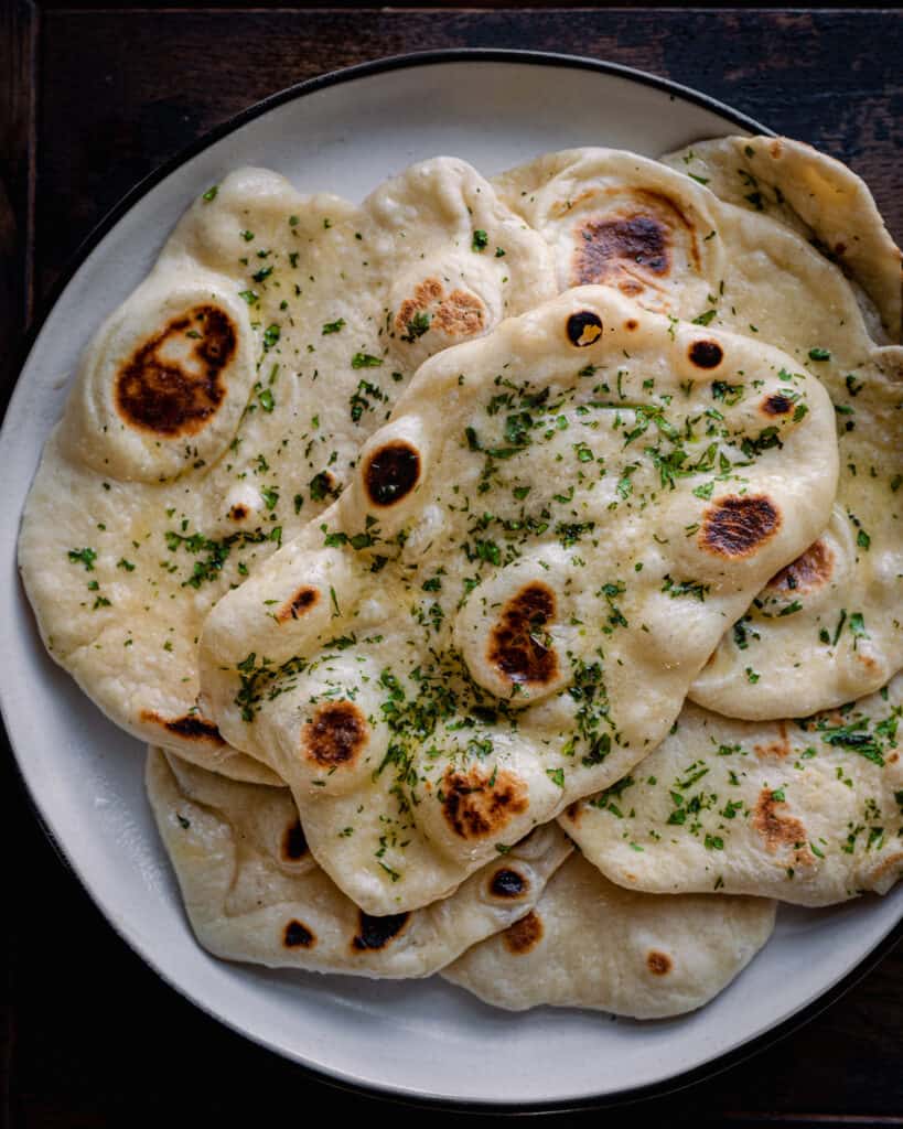vegan garlic naan on plate
