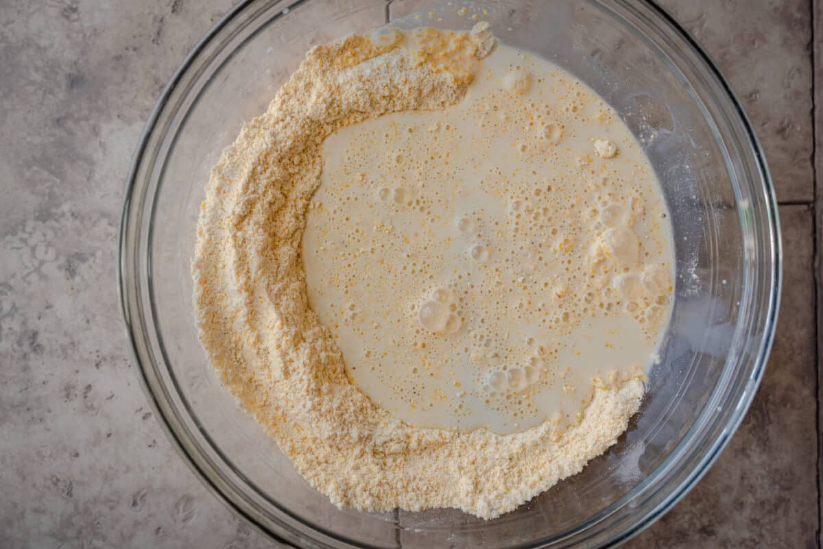 buttermilk and cornmeal in a bowl