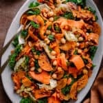 butternut squash and cabbage salad with kale on platter