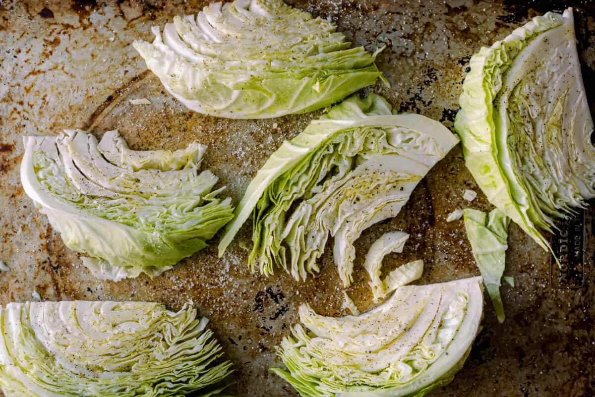 cabbage wedges on baking sheet
