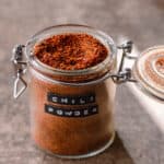 homemade chili powder in a glass jar.