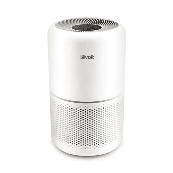 Levoit air purifier on white backdrop.