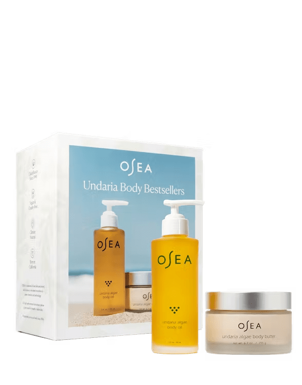 Osea body oil and body butter in front of the box they come in.