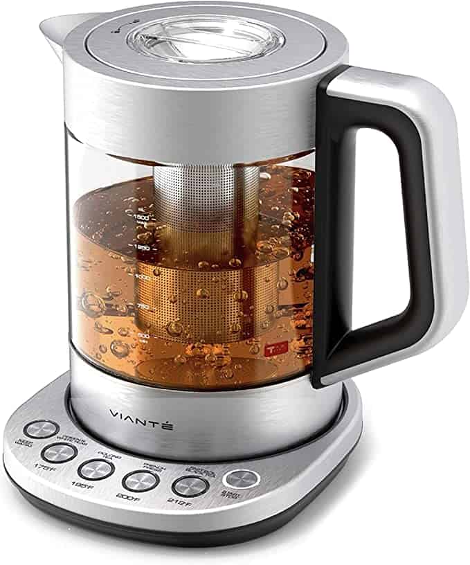 Electric tea kettle with tea diffusing inside of it.