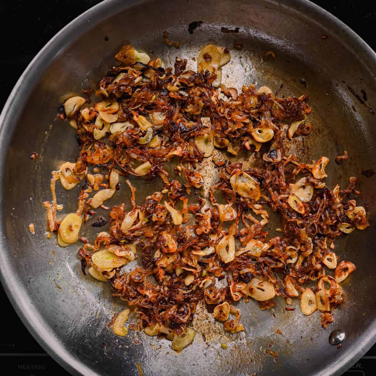 caramelized shallots and garlic in a skillet