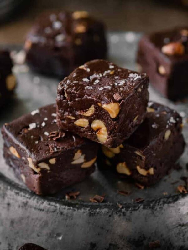 three pieces of vegan fudge on a plate.
