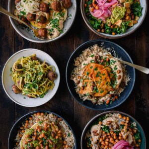 6 healthy vegan meals on a wooden table