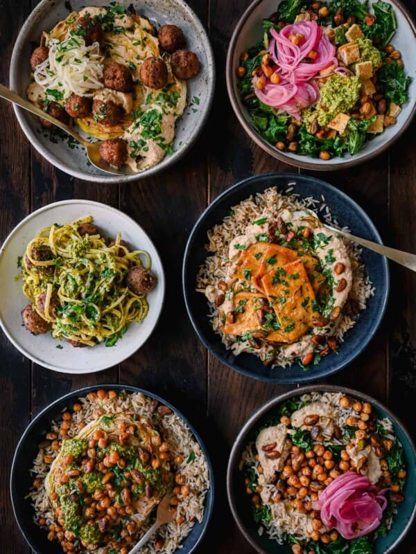 6 healthy vegan meals on a wooden table