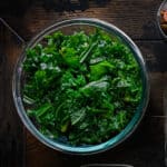 massaged kale in glass tupperware
