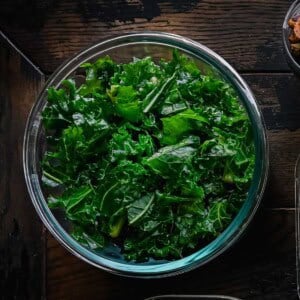 massaged kale in glass tupperware