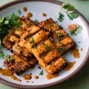 A plate of food with broccoli, with Tofu