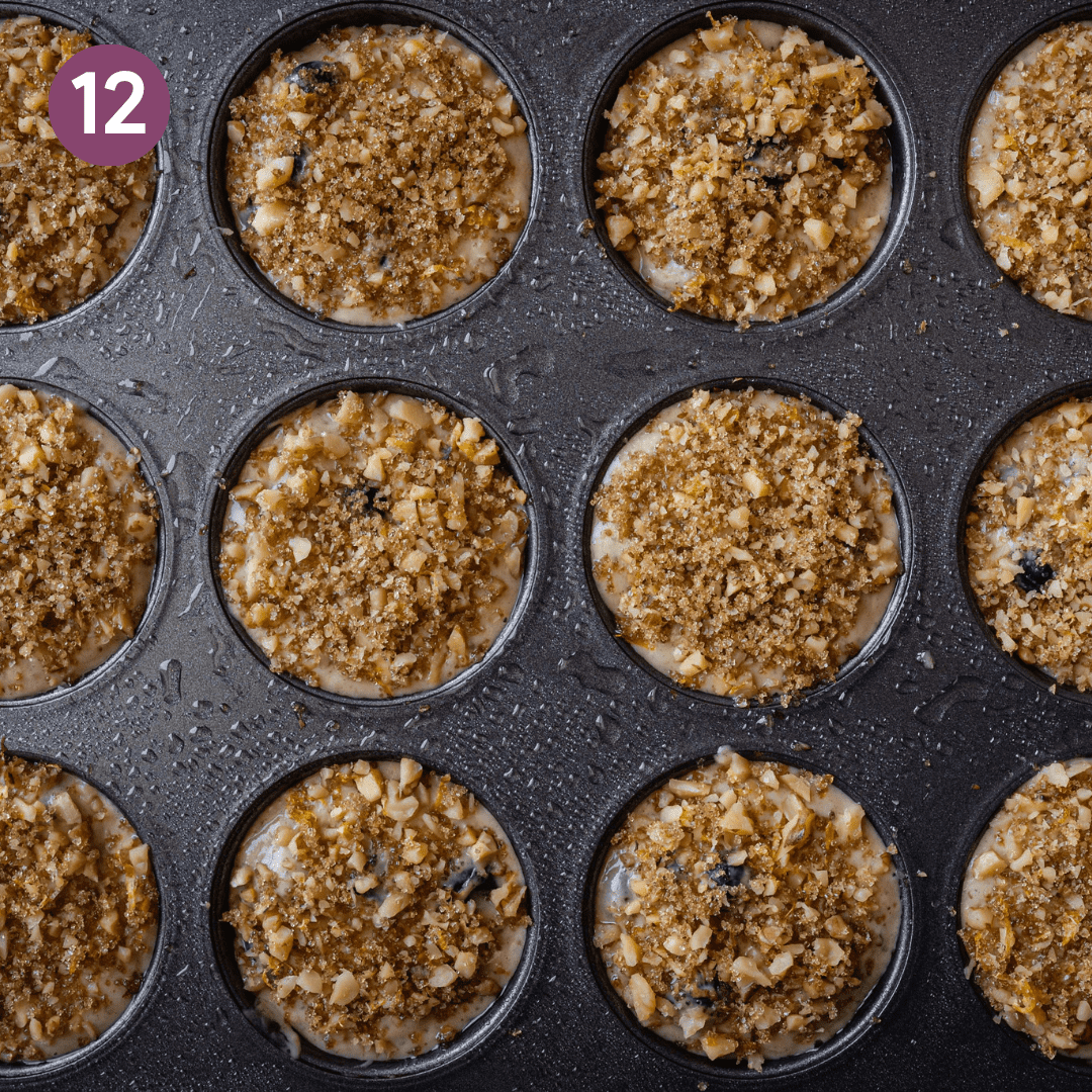crumble topping on top of muffins in muffin tin.
