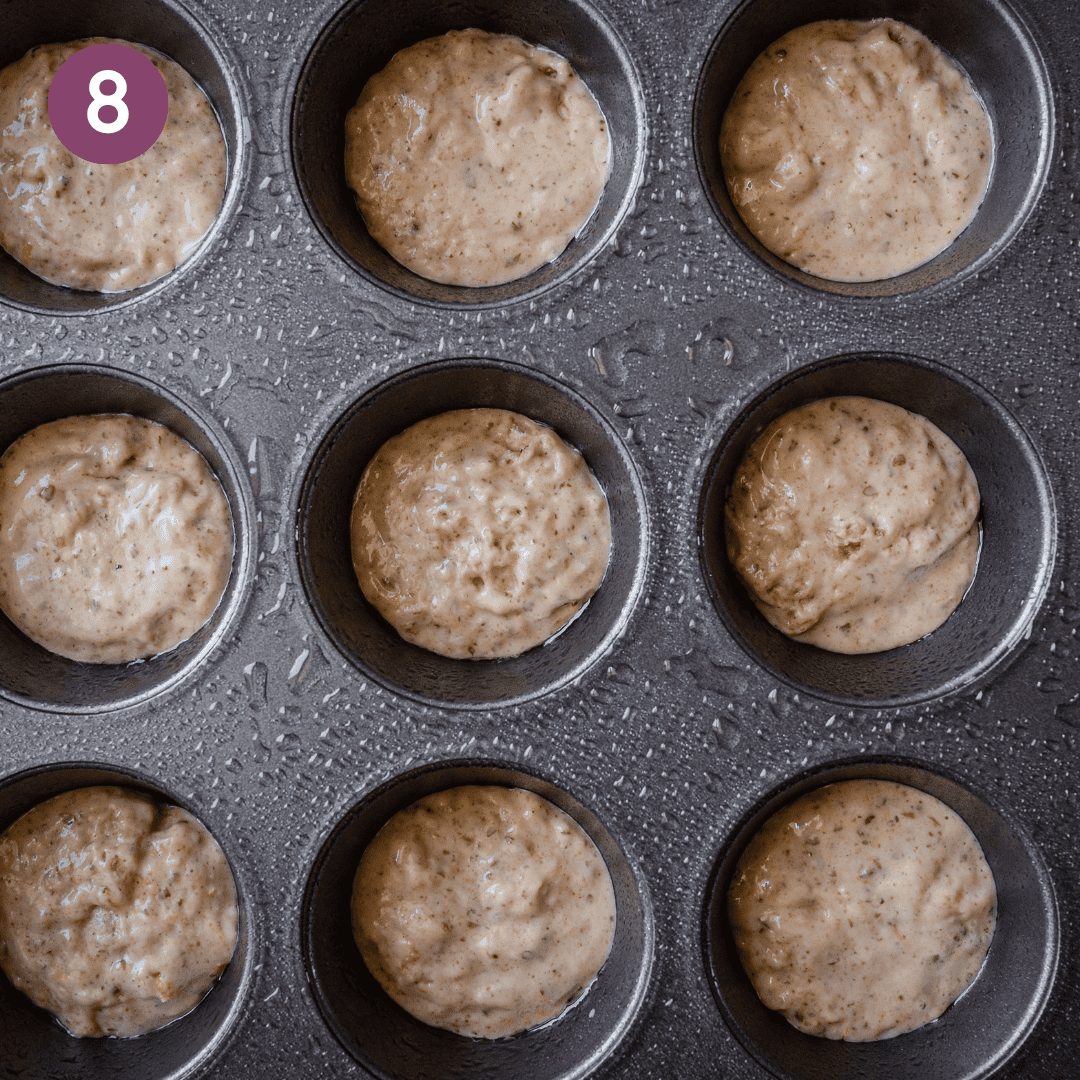 vegan muffin batter spooned halfway up muffin tins.