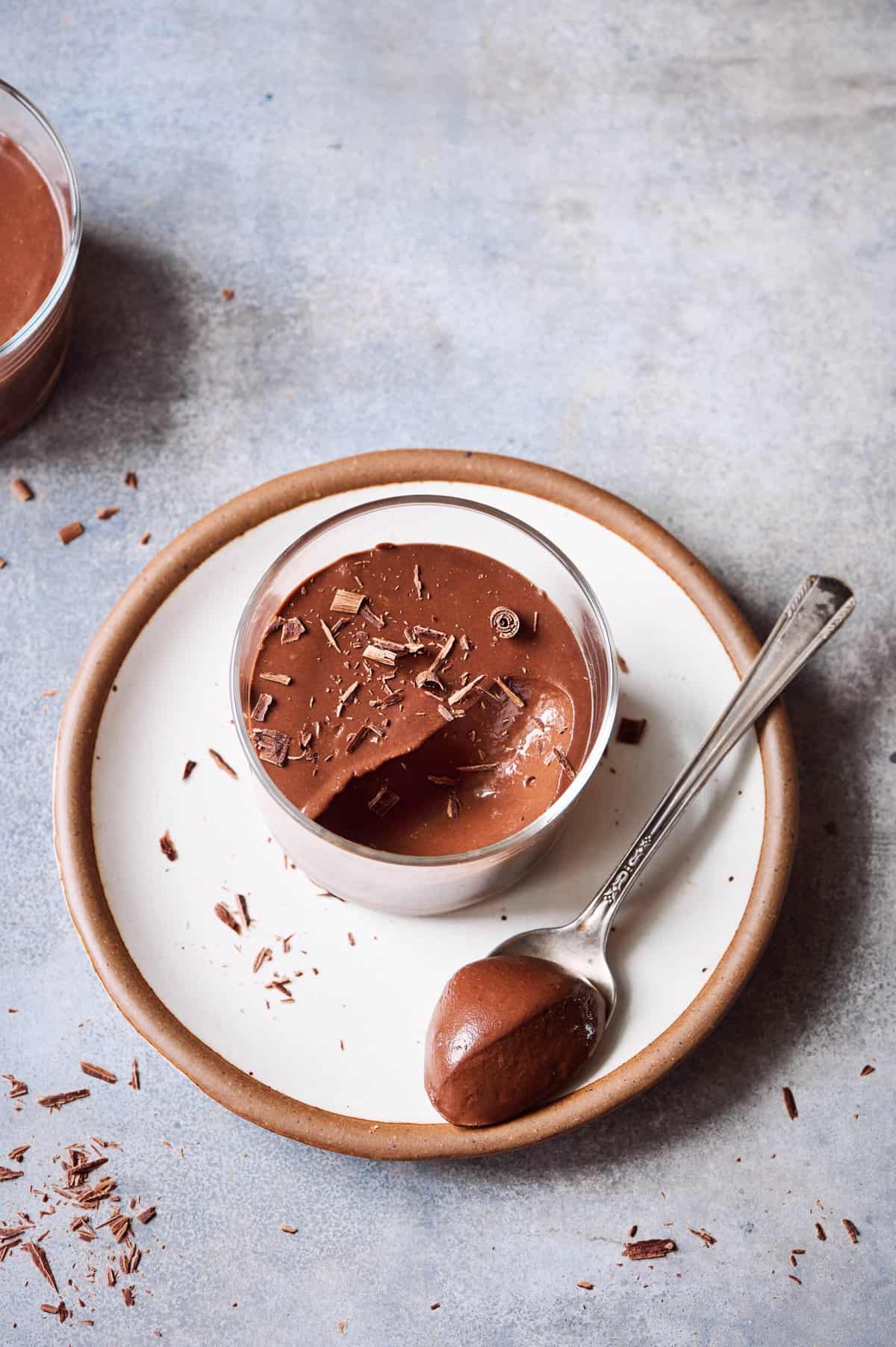 Overhead photo of one ramekin of mousse with no compote.