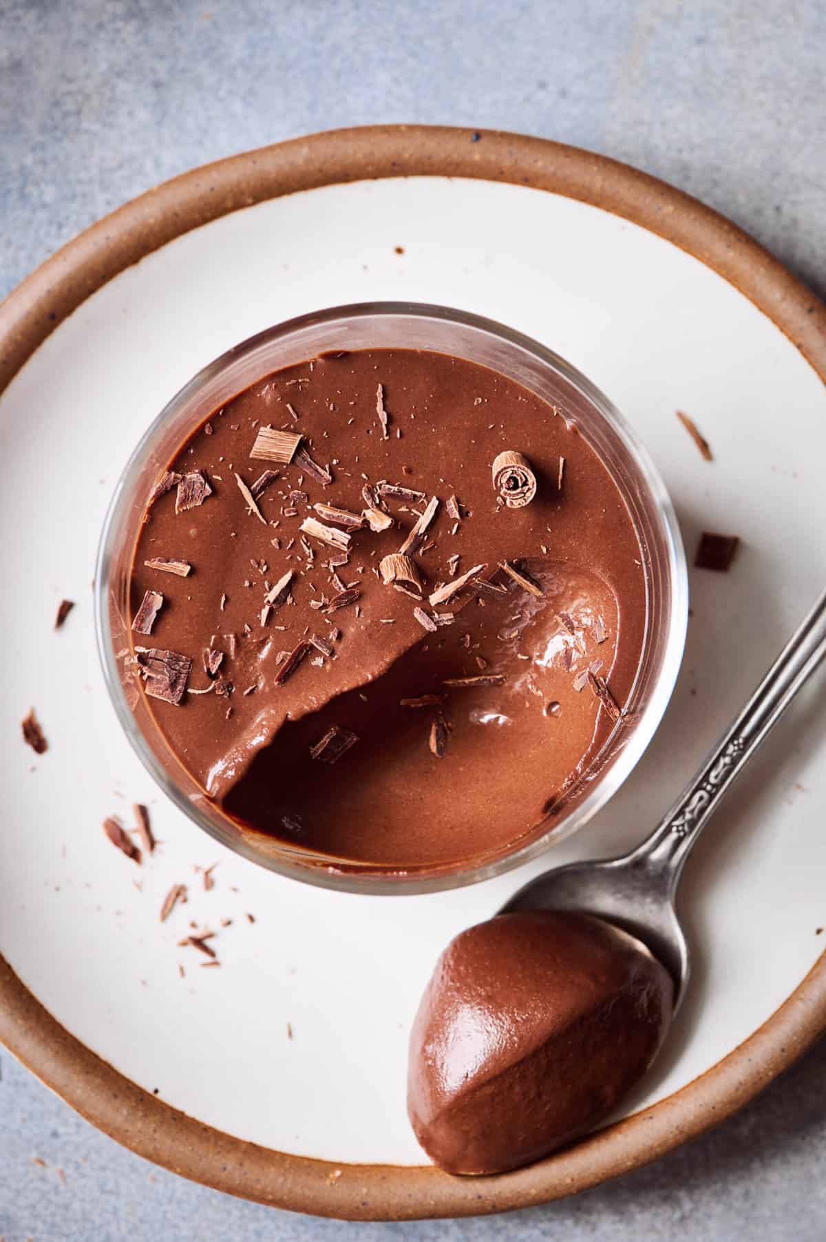 Close up photo of one ramekin of mousse with no compote.