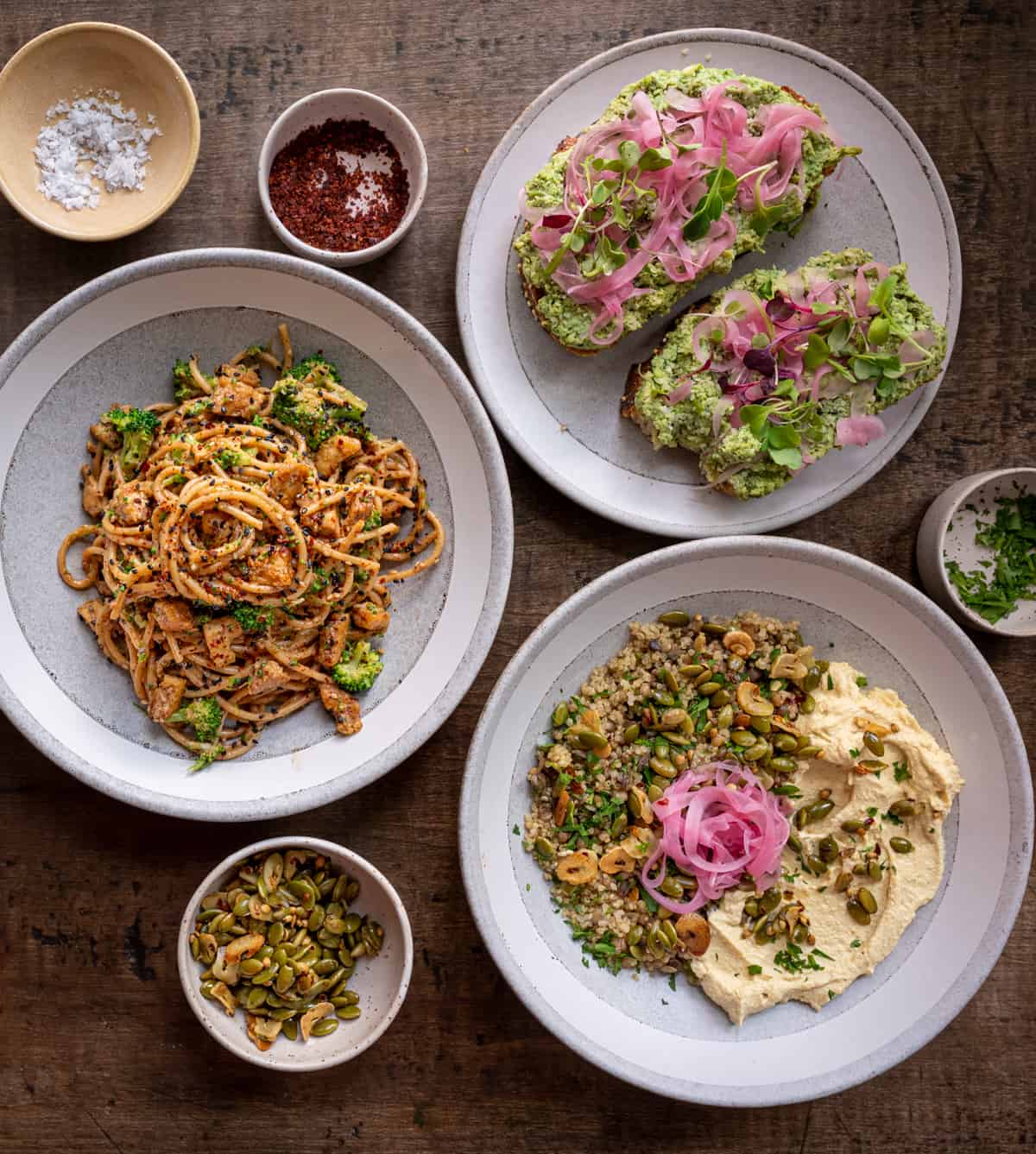 three high protein vegan meals on a table
