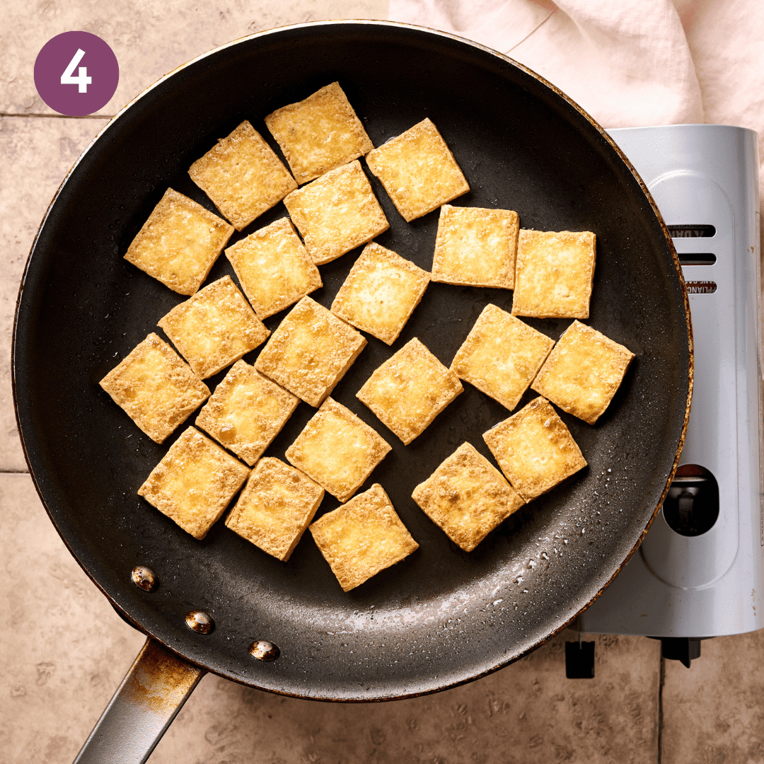 Golden fried tofu in the pan.