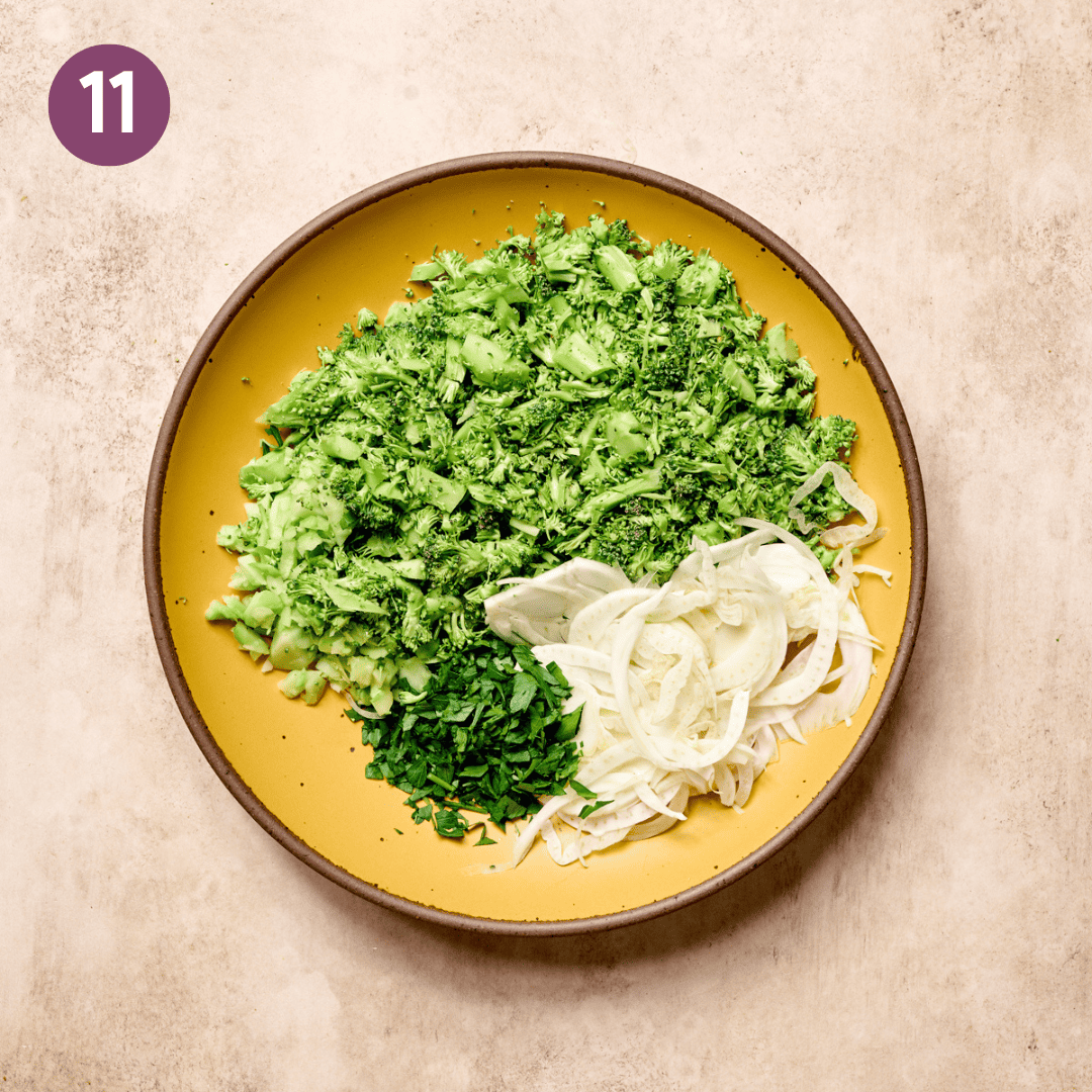 Broccoli, fennel and parsley in a large serving bowl.