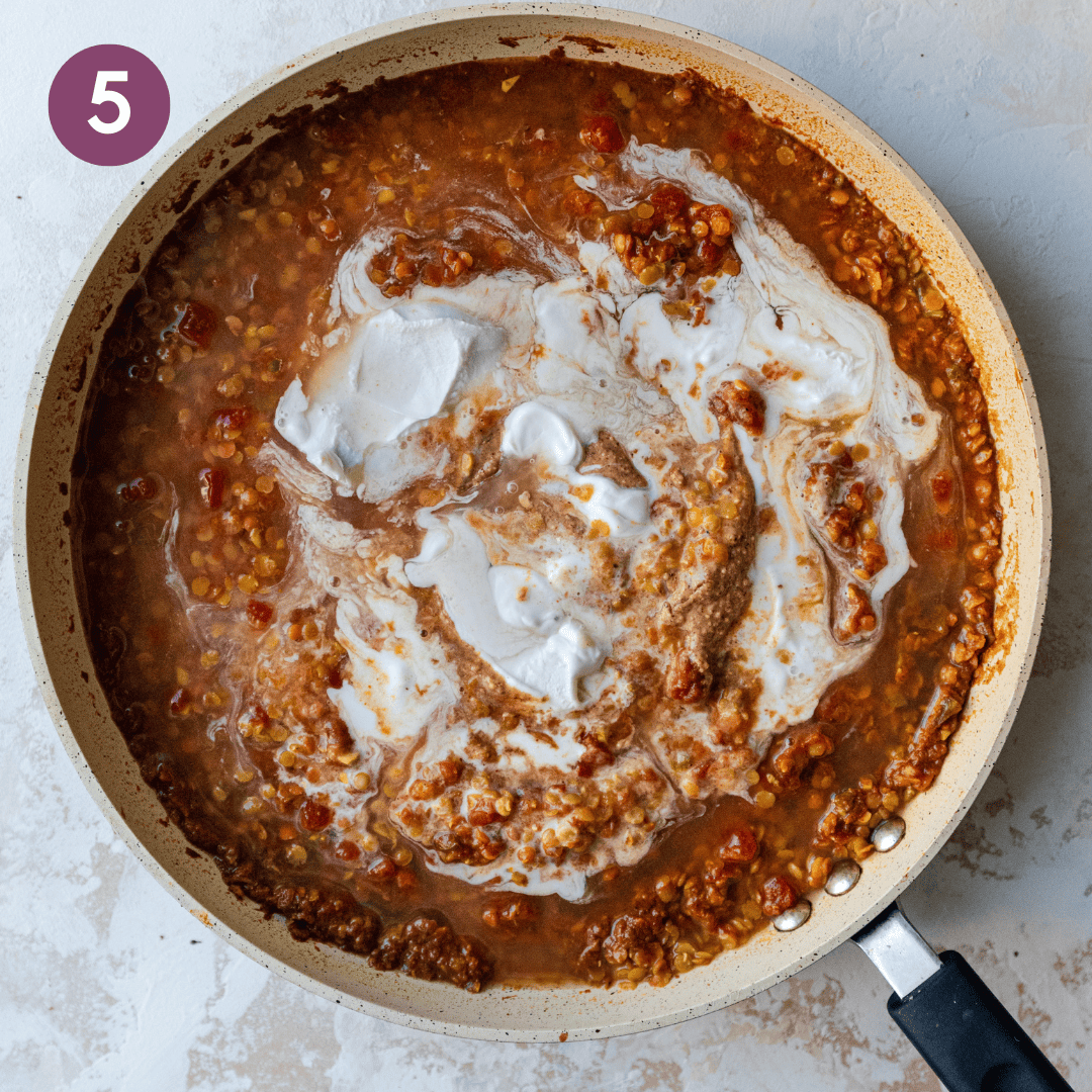 coconut milk, almond butter, salt and pepper added to cooked lentil mixture in skillet.