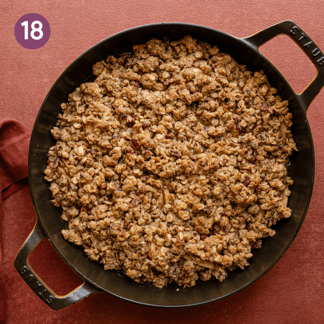 Apple crisp in skillet after being baked.