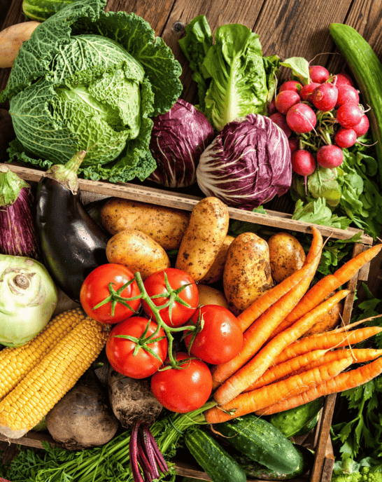 beautiful spread of fresh produce on wooden table.