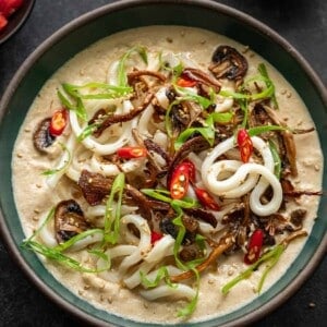 umami noodle soup in a bowl on a table.