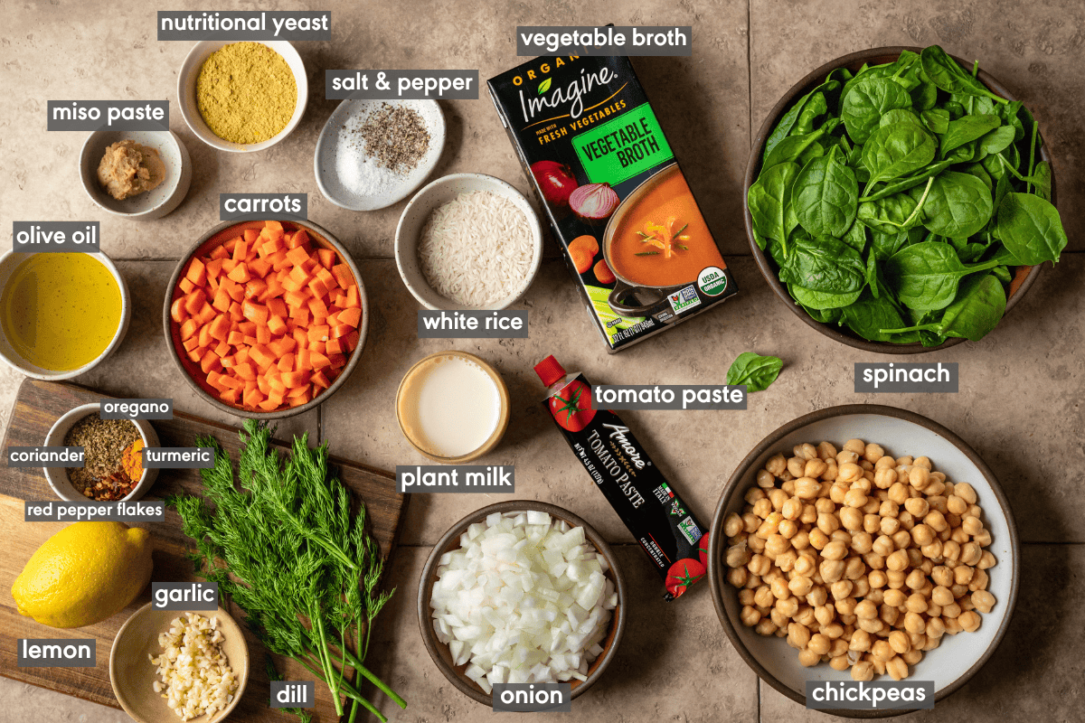 ingredients for chickpea soup laid out in bowls on a table.