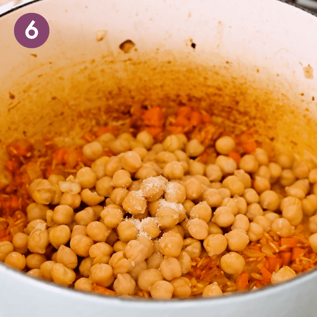 chickpeas, salt and pepper added to the soup pot.