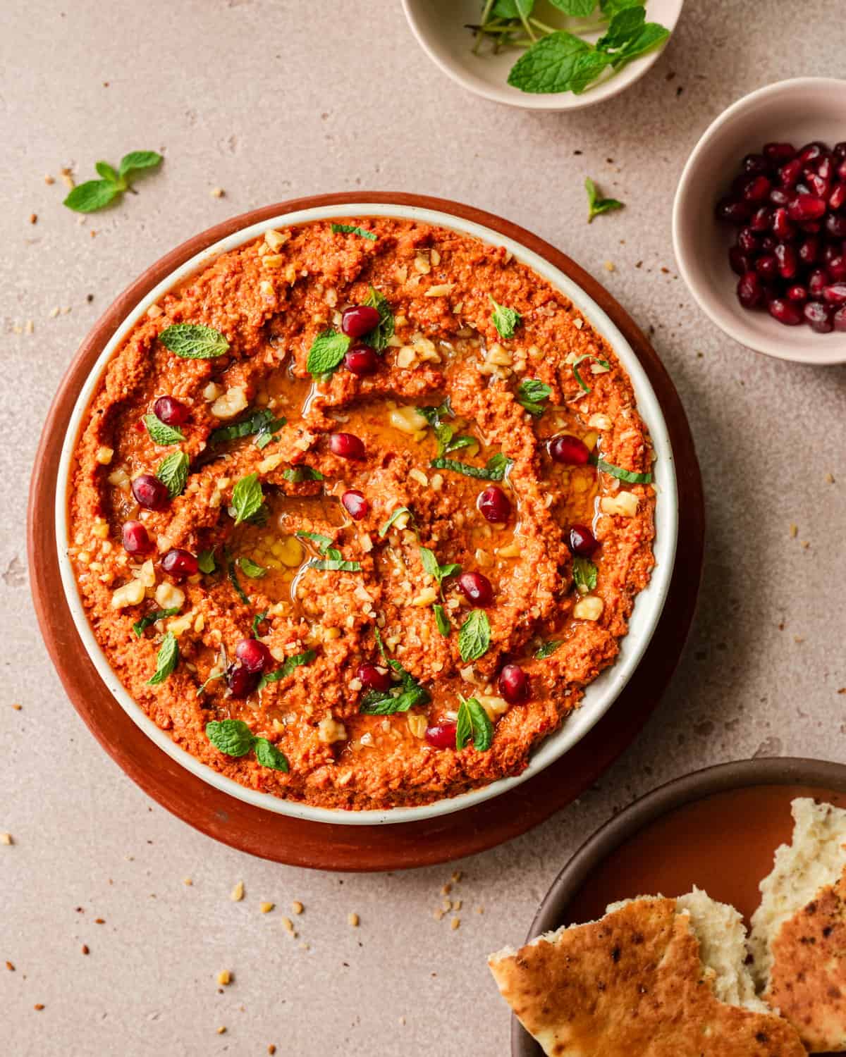 overhead shot of muhammara in a large shallow bowl.