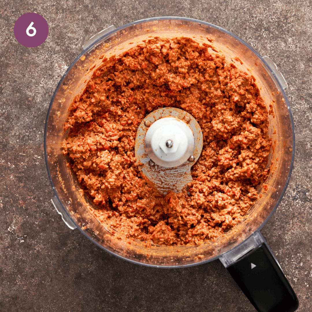 muhammara dip after being blended in a food processor. 