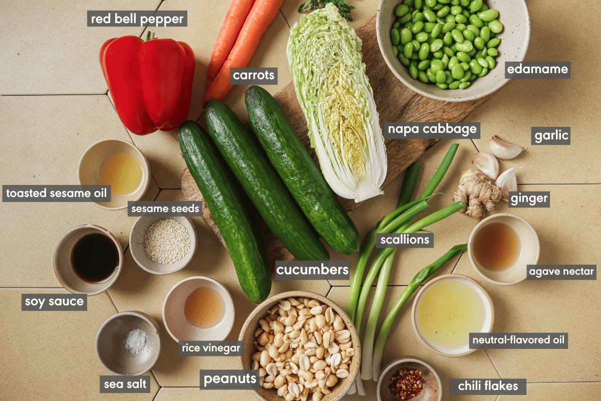 napa cabbage salad ingredients laid out on a table.