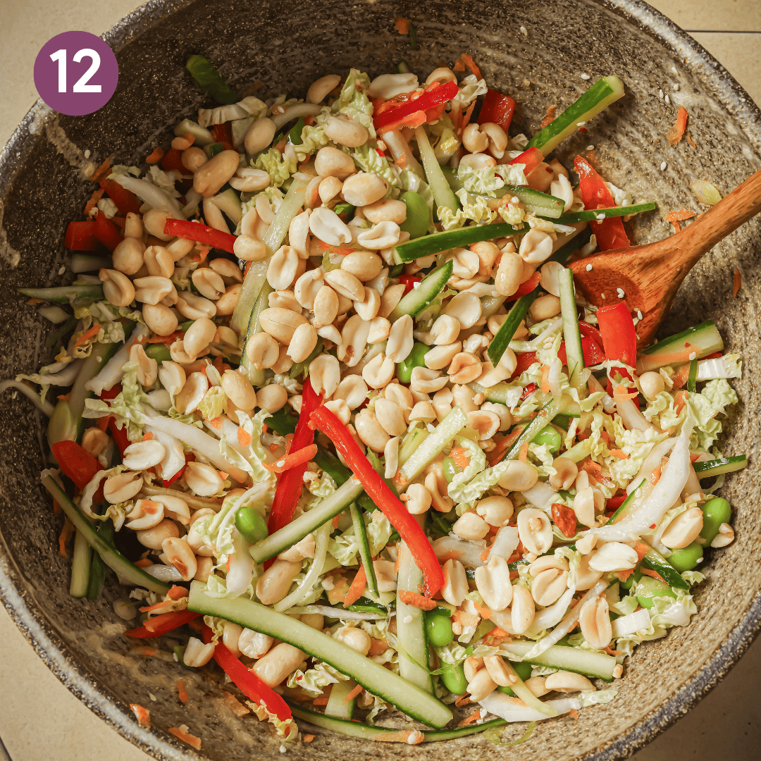 final mixed salad in the bowl with peanuts on top.