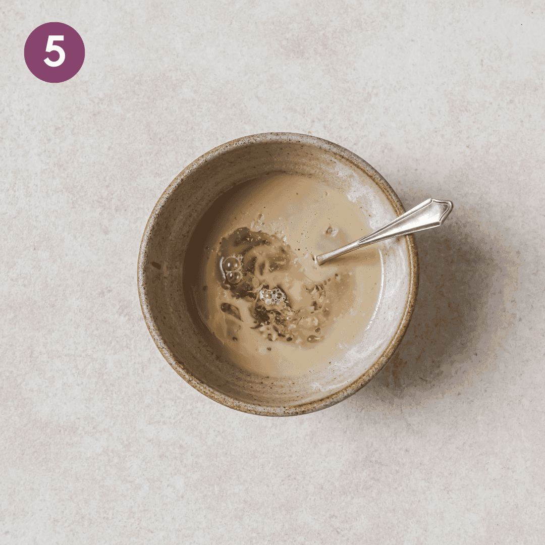 tahini dressing ingredients in a small bowl before being mixed.