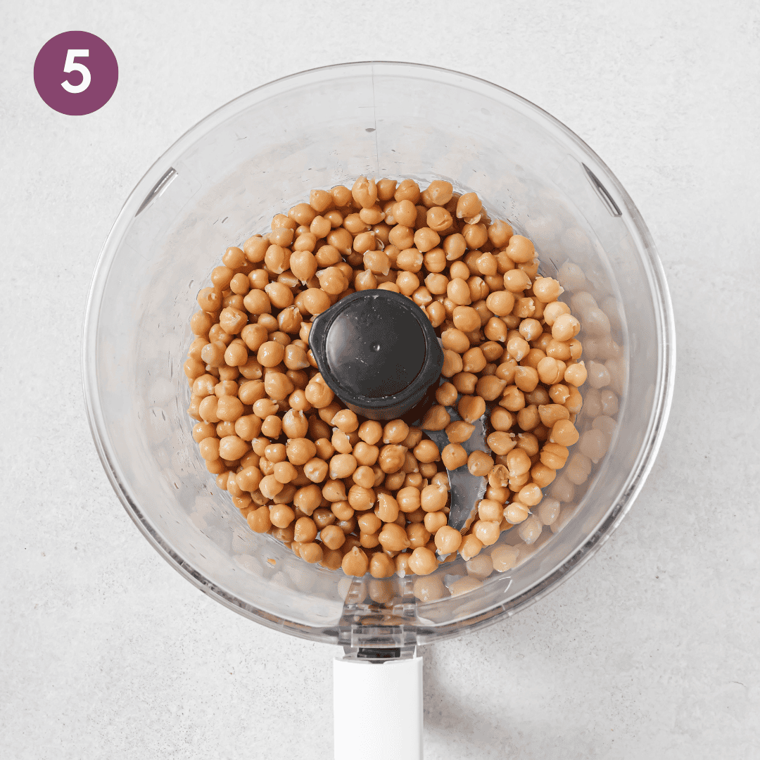 boiled and drained chickpeas in a food processor.