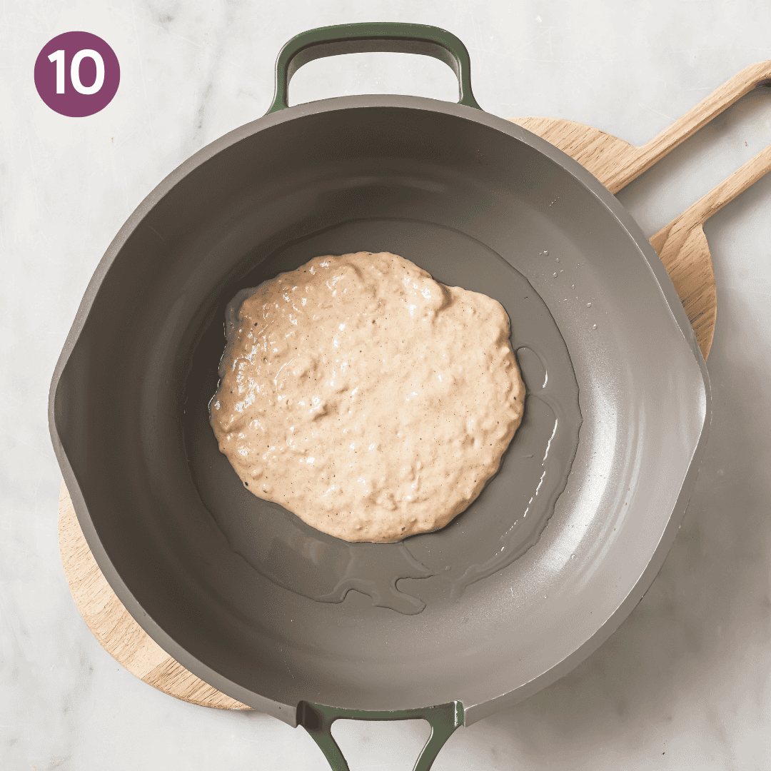 Pancake in skillet before being cooked.
