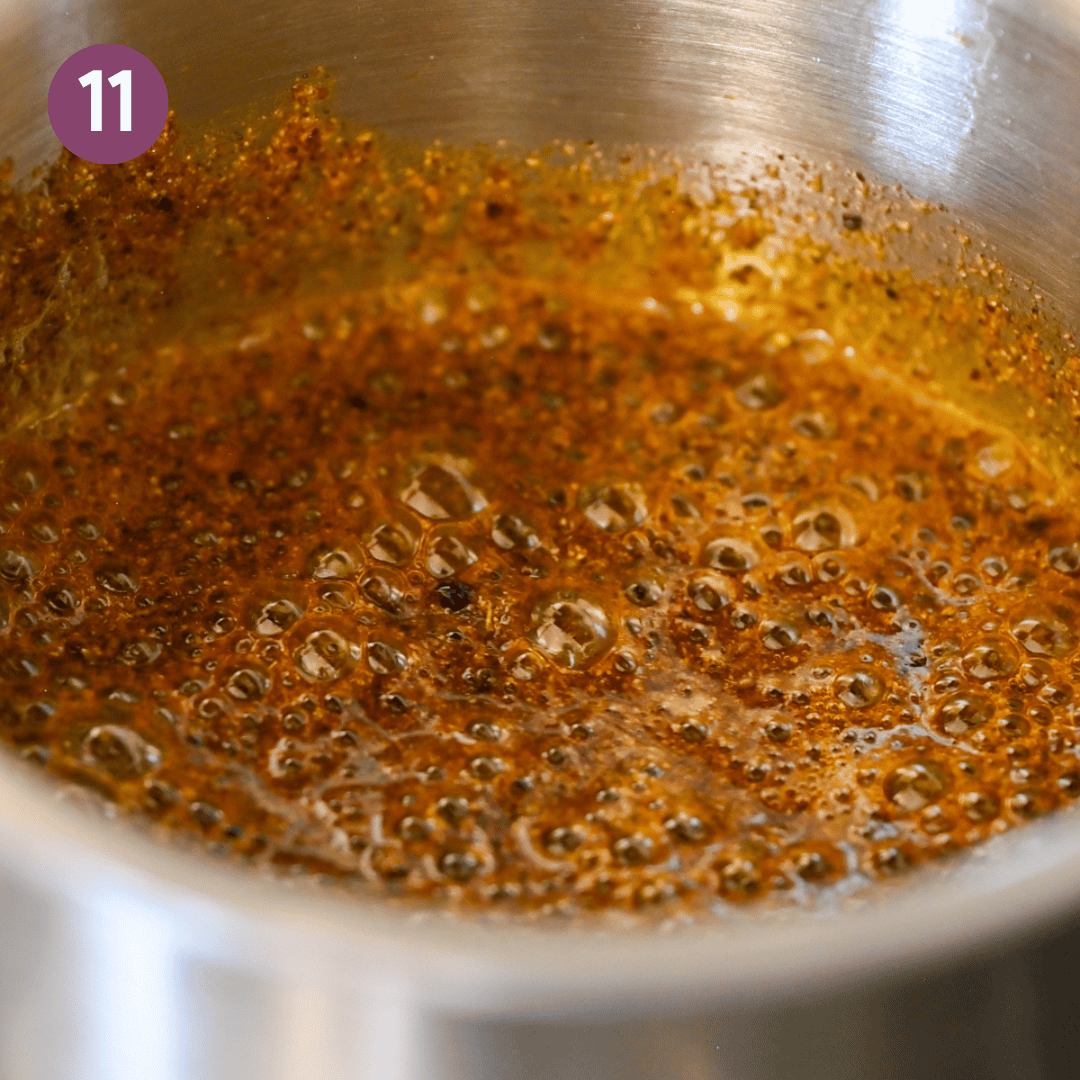 close up of the tempered oil in the saucepan.