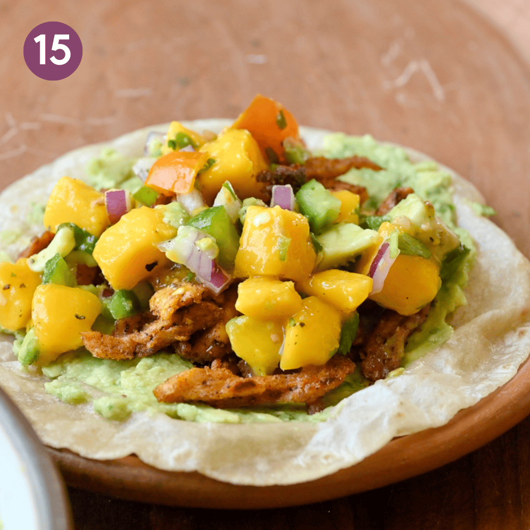 mango avocado salsa and lime juice added to the taco.