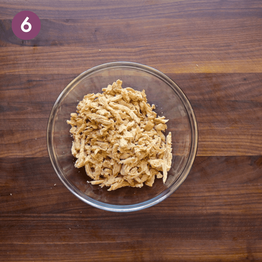 Chopped soy curls in a glass bowl.