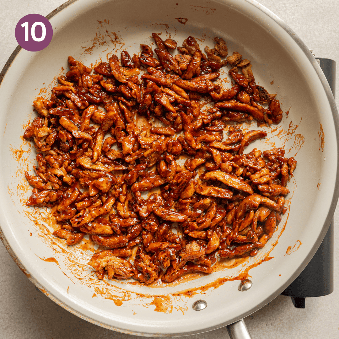 bbq sauce mixed into cooked soy curls in saucepan.