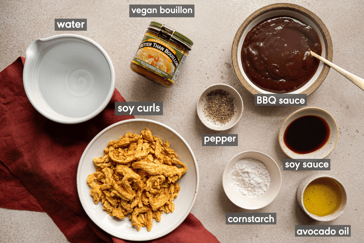 ingredients for vegan bbq pulled pork in various bowls on a table.