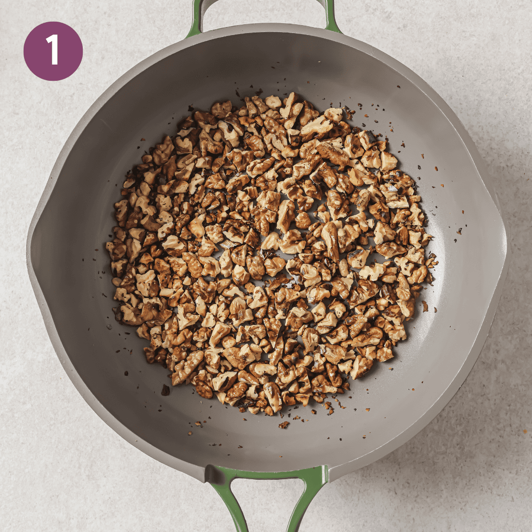 walnuts toasting in a saucepan.