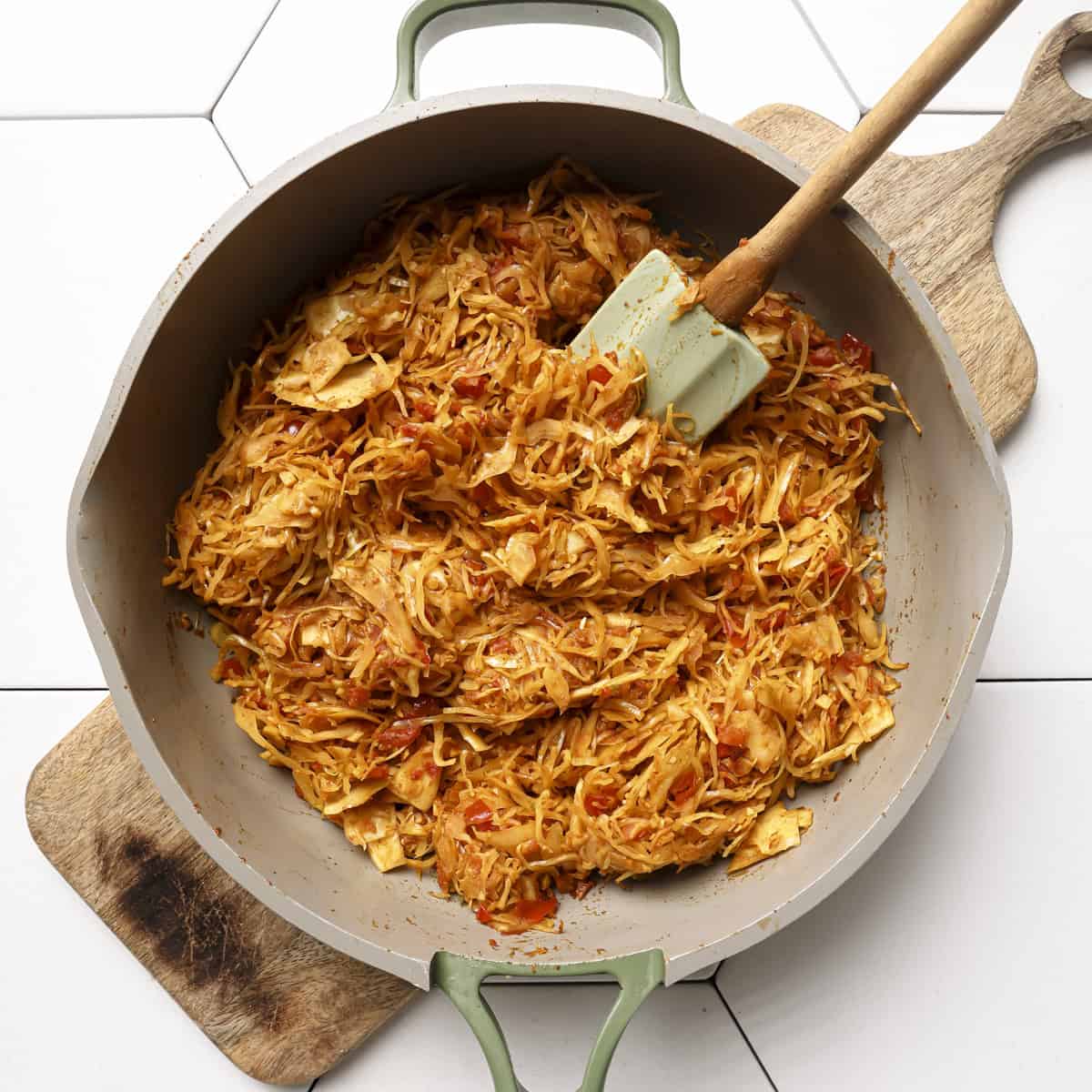 tomato paste and ground spices cooked into the cabbage.