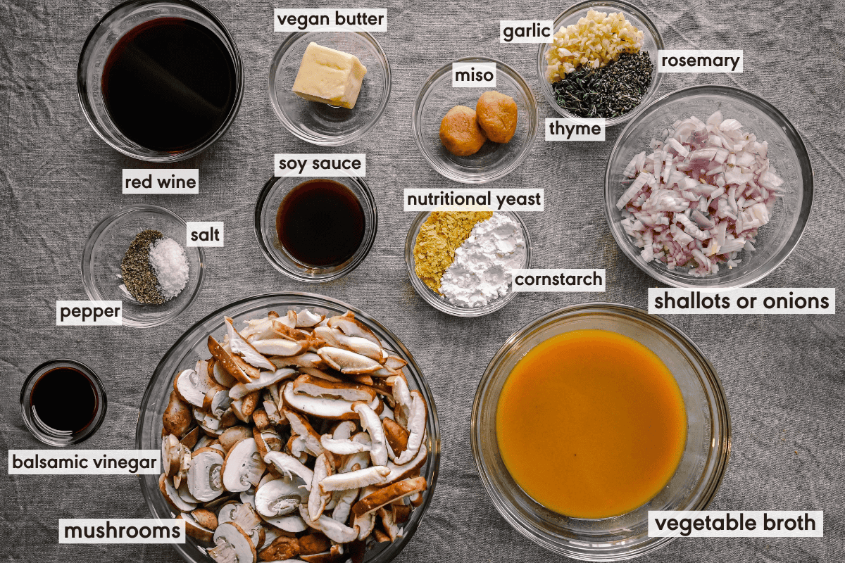 vegan gravy ingredients in various bowls on a table.