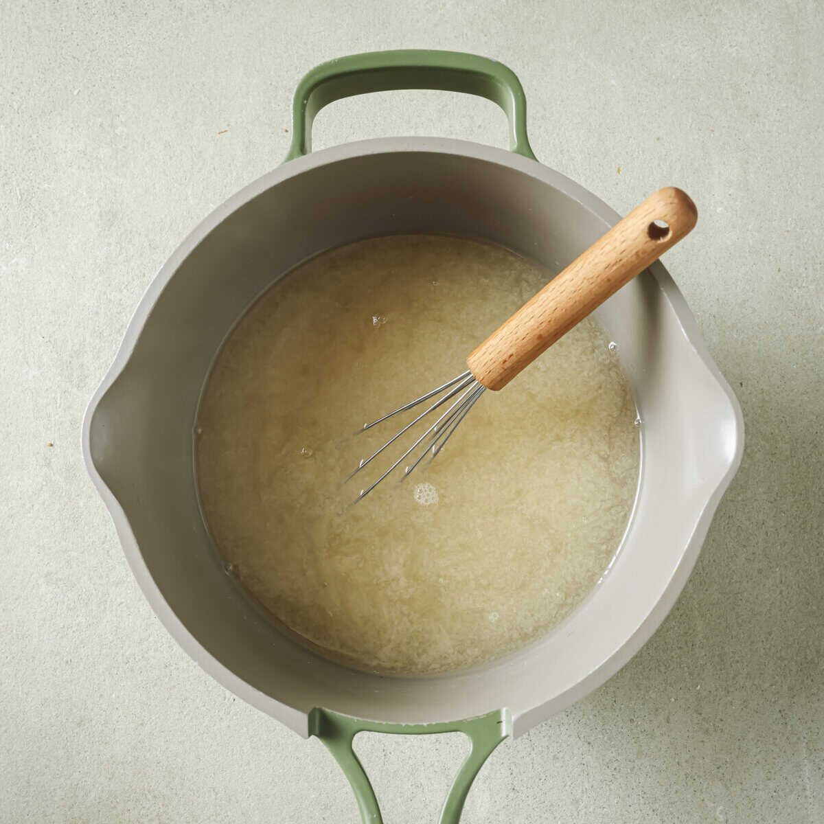 whisk in a pot with water and steel cut oats.