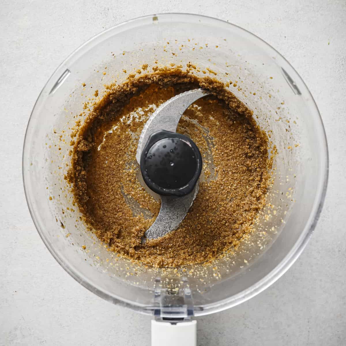 toasted walnuts and oil blended in a food processor.