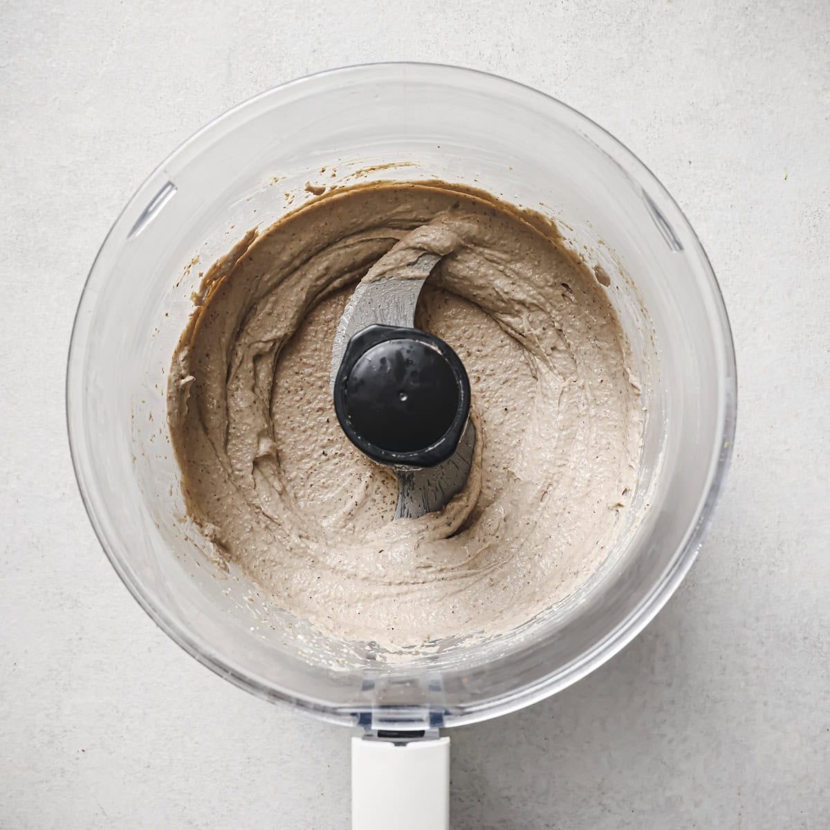 blended tofu walnut mixture in food processor.