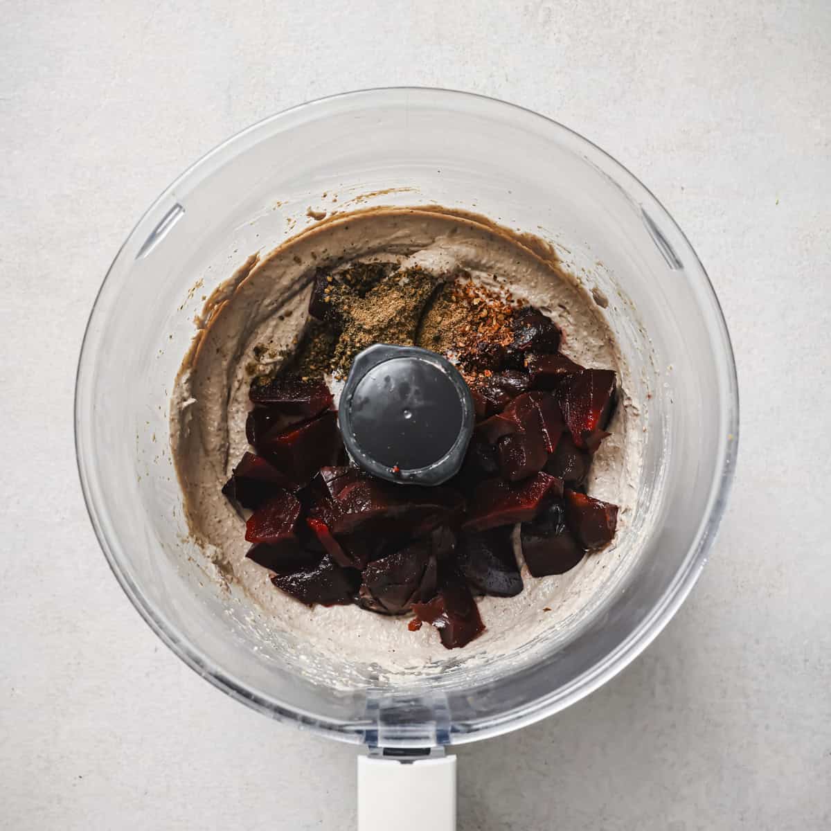 beets and spices added to the food processor.
