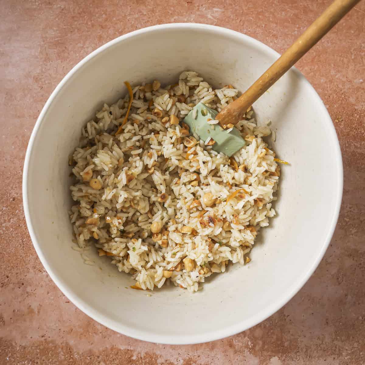 lemon juice, agave, orange juice and rice added to the bowl.