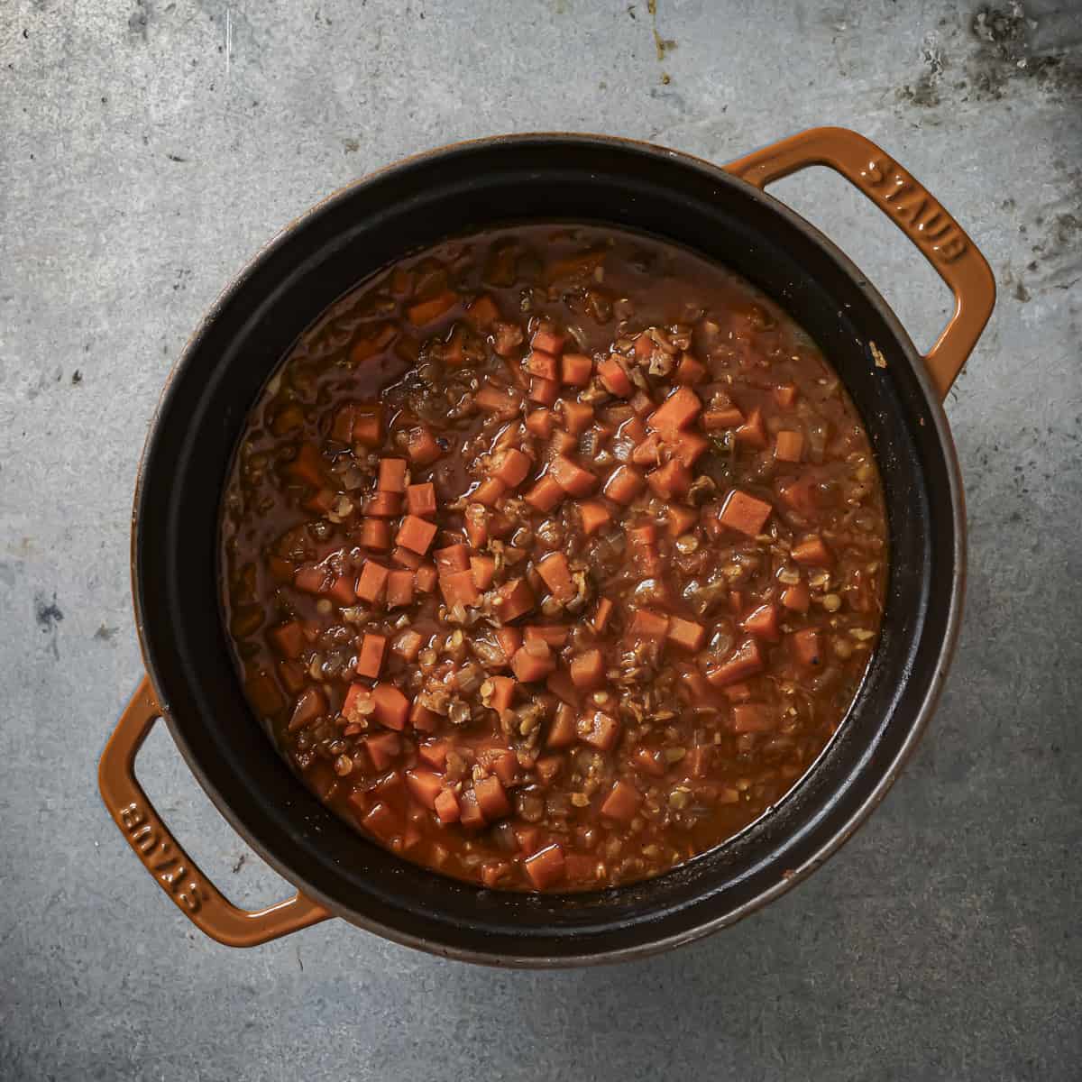 Soup in a pot after it's finished cooking.