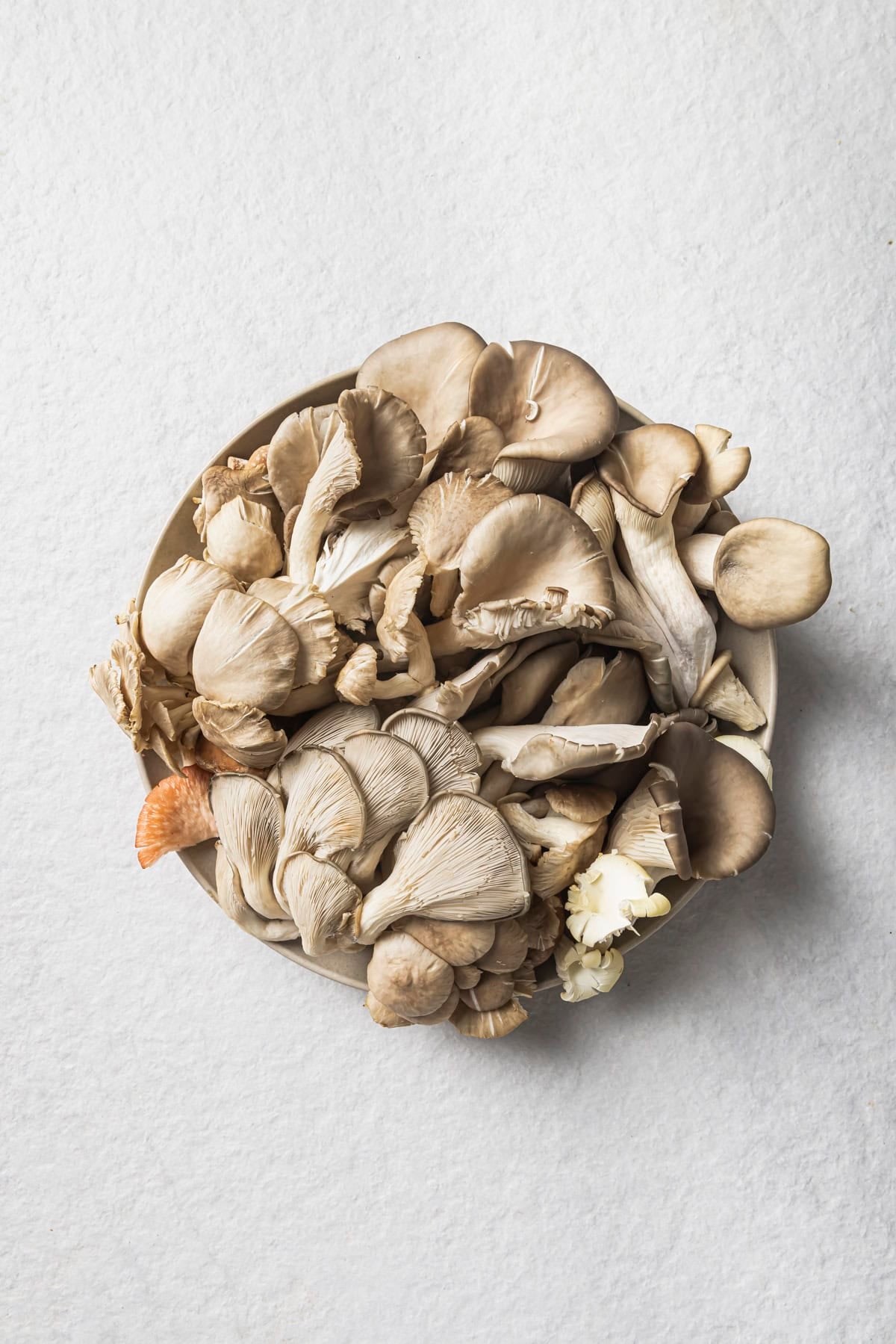 bowl of mushrooms on a table.